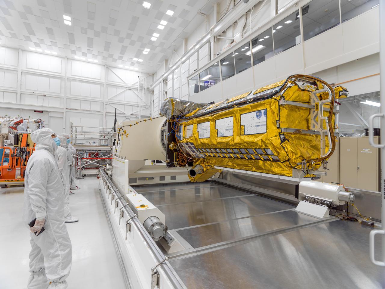       The NASA-ISRO Synthetic Aperture Radar (NISAR) science instrument payload sits in its specially designed, climate-controlled shipping container in a clean room at NASA's Jet Propulsion Laboratory on Feb. 23, 2023. Engineers and technicians used a crane to lift the payload and mount it vertically onto a stage at the far end of the container before tilting it horizontally. The payload was then shipped to Bengaluru, India, on March 3, arriving on March 6. There it will be integrated with the satellite body, or bus, and undergo further testing leading up to launch in 2024.      The NISAR mission – a joint effort between NASA and the Indian Space Research Organisation – will observe nearly all the planet's land and ice surfaces twice every 12 days, measuring movements in extremely fine detail. It will also survey forests and agricultural regions to understand carbon exchange between plants and the atmosphere. NISAR's science payload will be the most advanced radar system ever launched as part of a NASA mission, and it will feature the largest-ever radar antenna of its kind: a drum-shaped, wire mesh reflector nearly 40 feet (12 meters) in diameter that will extend from a 30-foot (9-meter) boom.      The mission's science instruments consist of L- and S-band radar, so named to indicate the wavelengths of their signals. ISRO built the S-band radar, which it shipped to JPL in March 2021. Engineers spent much of the last two years integrating the instrument with the JPL-built L-band system, then conducting tests to verify they work well together.      JPL, which is managed for NASA by Caltech in Pasadena, leads the U.S. component of NISAR. In addition to the L-band radar, NASA is also providing the radar reflector antenna, the deployable boom, a high-rate communication subsystem for science data, GPS receivers, a solid-state recorder, and payload data subsystem. In addition to the S-band radar, ISRO is providing the spacecraft bus, the launch vehicle, and associated launch services and satellite mission operations.  https://photojournal.jpl.nasa.gov/catalog/PIA25566