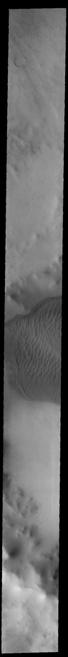 This VIS image shows part of the large sand sheet with surface dune forms on the floor of Charlier Crater in Terra Sirenum. Orbit Number: 91804 Latitude: -68.028 Longitude: 190.573 Instrument: VIS Captured: 2022-08-25 10:08 https://photojournal.jpl.nasa.gov/catalog/PIA25644