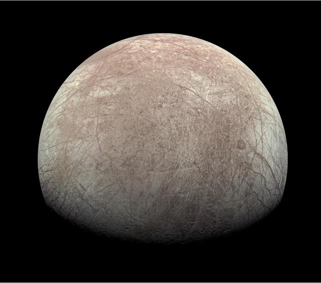 This view of Jupiter's icy moon Europa was captured by JunoCam, the public engagement camera aboard NASA's Juno spacecraft, during the mission's close flyby on Sept. 29, 2022. The picture is a composite of JunoCam's second, third, and fourth images taken during the flyby, as seen from the perspective of the fourth image. North is to the left.  The images have a resolution of just over 0.5 to 2.5 miles per pixel (1 to 4 kilometers per pixel).  As with our Moon and Earth, one side of Europa always faces Jupiter, and that is the side of Europa visible here. Europa's surface is crisscrossed by fractures, ridges, and bands, which have erased terrain older than about 90 million years.  Citizen scientist Kevin M. Gill processed the images to enhance the color and contrast.  https://photojournal.jpl.nasa.gov/catalog/PIA25695