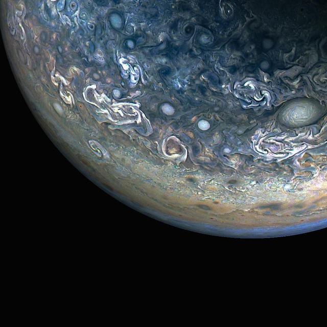 During its 61st close flyby of Jupiter on May 12, 2024, NASA's Juno spacecraft captured this color-enhanced view of the giant planet's northern hemisphere. It provides a detailed view of chaotic clouds and cyclonic storms in an area known to scientists as a folded filamentary region. In these regions, the zonal jets that create the familiar banded patterns in Jupiter's clouds break down, leading to turbulent patterns and cloud structures that rapidly evolve over the course of only a few days. Citizen scientist Gary Eason made this image using raw data from the JunoCam instrument, applying digital processing techniques to enhance color and clarity. At the time the raw image was taken, the Juno spacecraft was about 18,000 miles (29,000 kilometers) above Jupiter's cloud tops, at a latitude of about 68 degrees north of the equator. https://photojournal.jpl.nasa.gov/catalog/PIA25729