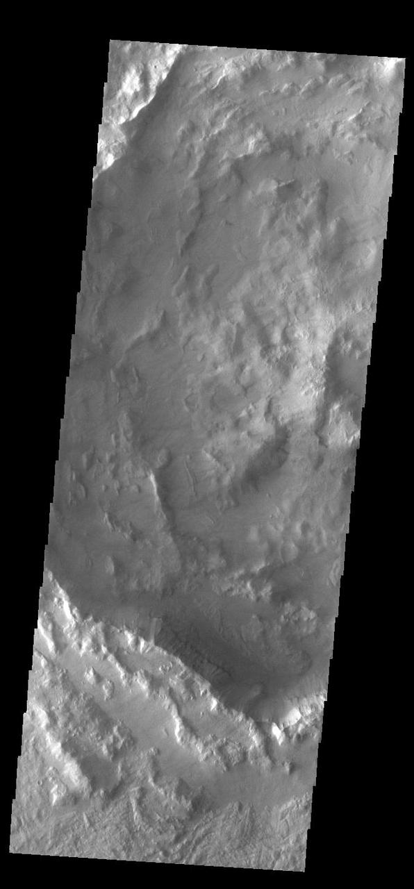Today's VIS image shows part of an unnamed crater located in Noachis Terra. Unlike most Martian craters, this one has a very rugged floor. Most craters have flat floors, having been filled with materials such as sand blown into the crater, layered deposits from short term lakes, and volcanic materials from nearby flows. The morphology of the crater floor indicates that this is a relatively young crater, with the original floor created during the impact event.  Orbit Number: 93133 Latitude: -41.7607 Longitude: 16.3316 Instrument: VIS Captured: 2022-12-12 20:18  https://photojournal.jpl.nasa.gov/catalog/PIA25841