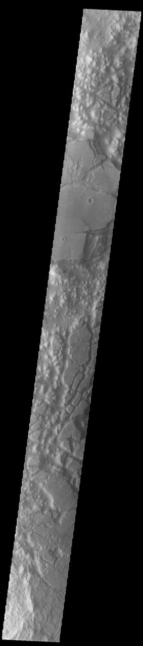 Today's VIS image shows a region of chaos terrain south of Eos Chasma. Chaos terrain is typified by regions of blocky, often steep sided, mesas interspersed with deep valleys. With time and erosion the valleys widen and the mesas become smaller. It has been proposed that a catastrophic outflow of subsurface water creates the chaos. Orbit Number: 93210 Latitude: -16.1911 Longitude: 318.75 Instrument: VIS Captured: 2022-12-19 04:19 https://photojournal.jpl.nasa.gov/catalog/PIA25848
