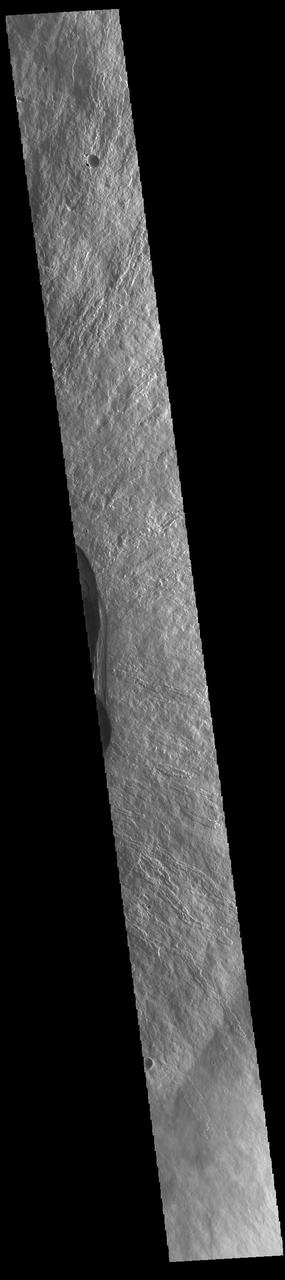 This VIS image shows part of the summit of Ascraeus Mons. Ascraeus Mons is the northernmost and tallest of the three large aligned Tharsis volcanoes. Calderas are found at the tops of volcanoes and are the source region for magma that rises from an underground lava source to erupt at the surface. Volcanoes are formed by repeated flows from the central caldera. The final eruptions can pool within the summit caldera, leaving a flat surface as they cool. Calderas are also a location of collapse, creating rings of tectonic faults that form the caldera rim. Ascraeus Mons has several caldera features at its summit. Ascraeus Mons is 18 km (11 miles) tall, for comparison Mauna Kea – the tallest volcano on Earth – is 10 km tall (6.2 miles, measured from the base below sea level).  Orbit Number: 93767 Latitude: 11.2722 Longitude: 11.2722 Instrument: VIS Captured: 2023-02-03 01:58  https://photojournal.jpl.nasa.gov/catalog/PIA25875