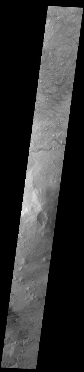 Today's VIS image shows part of the northeastern rim of Jezero Crater. The Perserverance Rover is located on the northwestern part of the crater – near a delta deposit formed by the influx of silt laden water into the crater at a time during Mars' past that was wetter. The crater most likely hosted a lake for a period of time. The channel in the center of this image was formed by the flow of water exiting the crater. Orbit Number: 93804 Latitude: 18.3721 Longitude: 78.2125 Instrument: VIS Captured: 2023-02-06 03:55 https://photojournal.jpl.nasa.gov/catalog/PIA25903