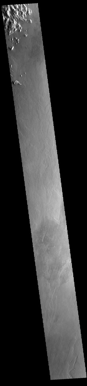 Today's VIS image is located east of Olympus Mons. The majority of the image is comprised of volcanic flows.  Orbit Number: 93930 Latitude: 20.4219 Longitude: 232.562 Instrument: VIS Captured: 2023-02-16 12:08  https://photojournal.jpl.nasa.gov/catalog/PIA25928