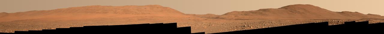 Composed of 53 images, this mosaic looks west toward the rim of Mars' Jezero Crater on July 8, 2023, the 847th Martian day, or sol, of NASA's Perseverance rover mission. The rover's Mastcam-Z instrument captured the images when Perseverance was about halfway through a boulder field that was 0.6 miles (1 kilometer) wide.   Arizona State University leads the operations of the Mastcam-Z instrument, working in collaboration with Malin Space Science Systems in San Diego, on the design, fabrication, testing, and operation of the cameras, and in collaboration with the Niels Bohr Institute of the University of Copenhagen on the design, fabrication, and testing of the calibration targets.  A key objective for Perseverance's mission on Mars is astrobiology, including the search for signs of ancient microbial life. The rover will characterize the planet's geology and past climate, pave the way for human exploration of the Red Planet, and be the first mission to collect and cache Martian rock and regolith (broken rock and dust).  Subsequent NASA missions, in cooperation with ESA (European Space Agency), would send spacecraft to Mars to collect these sealed samples from the surface and return them to Earth for in-depth analysis.  The Mars 2020 Perseverance mission is part of NASA's Moon to Mars exploration approach, which includes Artemis missions to the Moon that will help prepare for human exploration of the Red Planet.  https://photojournal.jpl.nasa.gov/catalog/PIA25965