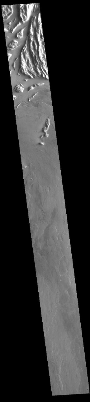 The top of today's VIS image shows a portion of Cyane Sulci. Located to the northeast of Olympus Mons, Cyane Sulci is a complexly fractured region of material inundated on its margins by volcanic flows.  Orbit Number: 94217 Latitude: 22.1596 Longitude: 232.704 Instrument: VIS Captured: 2023-03-12 03:17