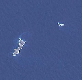 The eruption of Hunga Tonga-Hunga Ha'apai in 2022 produced a plume 58 km high, and produced the biggest atmospheric explosion ever recorded. At least six people lost their lives in the ensuing tsunami. The two small islands are all that is left visible of a huge underwater volcano. The image covers an area of 4.6 by 4.6 km, was acquired September 7, 2022, and is located at 20.5 degrees south, 175.4 degrees west.  https://photojournal.jpl.nasa.gov/catalog/PIA26006