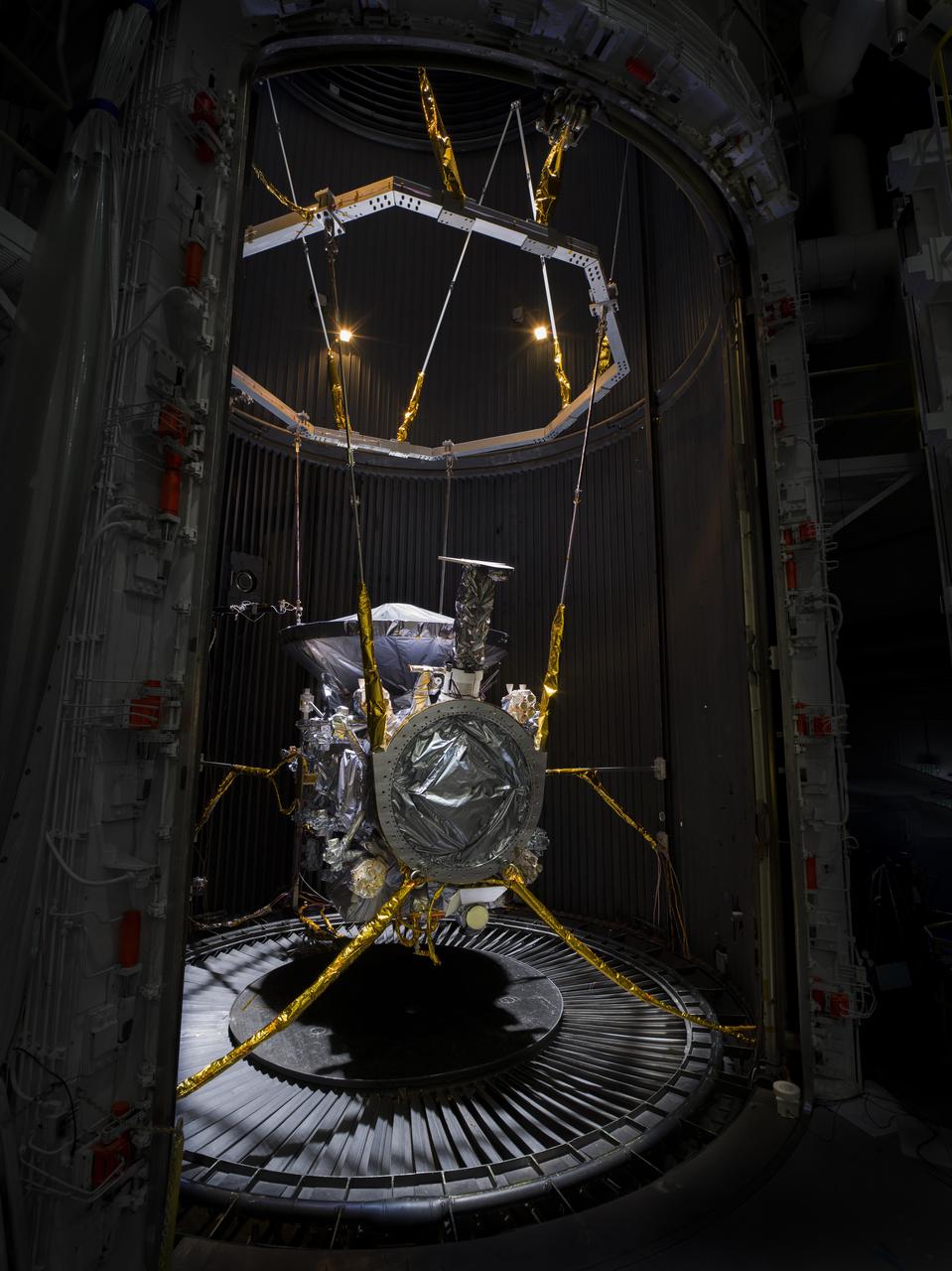 NASA's Europa Clipper spacecraft is seen in the 85-foot-tall, 25-foot-wide (26-meter-by-8-meter) vacuum chamber, known as the Space Simulator, at the agency's Jet Propulsion Laboratory in Southern California in February 2024. Shortly after this photo was taken, the spacecraft underwent 16 days of thermal vacuum chamber (TVAC) testing so that engineers can be sure the hardware will survive the extreme temperatures and airless environment of space. TVAC is part of a regimen called environmental testing that takes place before spacecraft are approved for flight.  Europa Clipper, set to launch in October 2024 from Kennedy Space Center in Florida, will arrive at the Jupiter system in 2030 and conduct about 50 flybys of the moon Europa. The mission's main science goal is to determine whether there are places below the surface of Europa that could support life. The mission's three main science objectives are to determine the thickness of the moon's icy shell and its surface interactions with the ocean below, to investigate its composition, and to characterize its geology. The mission's detailed exploration of Europa will help scientists better understand the astrobiological potential for habitable worlds beyond our planet.  https://photojournal.jpl.nasa.gov/catalog/PIA26064