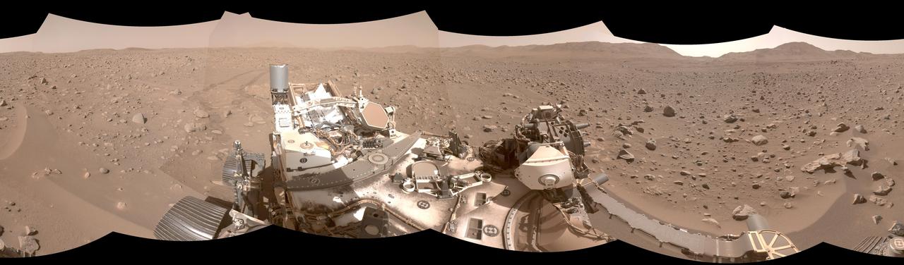 This mosaic shows part of the path NASA's Perseverance Mars rover took through a portion of a boulder field dubbed "Snowdrift Peak." It was generated using images taken by one of the rover's navigation cameras on July 28, 2023, the 866th day, or sol, of the mission.  With the help of its self-driving autonomous navigation system, AutoNav, Perseverance traversed the boulder field much more quickly than previous rovers could have.  A key objective for Perseverance's mission on Mars is astrobiology, including the search for signs of ancient microbial life. The rover will characterize the planet's geology and past climate, pave the way for human exploration of the Red Planet, and be the first mission to collect and cache Martian rock and regolith (broken rock and dust).  Subsequent NASA missions, in cooperation with ESA (European Space Agency), would send spacecraft to Mars to collect these sealed samples from the surface and return them to Earth for in-depth analysis.  The Mars 2020 Perseverance mission is part of NASA's Moon to Mars exploration approach, which includes Artemis missions to the Moon that will help prepare for human exploration of the Red Planet.  https://photojournal.jpl.nasa.gov/catalog/PIA26072
