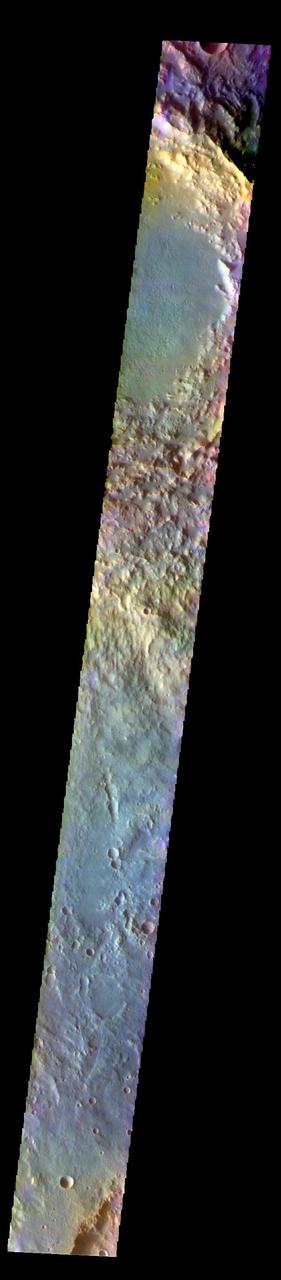 The THEMIS VIS camera contains 5 filters. The data from different filters can be combined in multiple ways to create a false color image. These false color images may reveal subtle variations of the surface not easily identified in a single band image. Today's false color image shows part of Terra Cimmeria. Soffen Crater is at the top of the image, and is 58 km (36 miles) in diameter.  The THEMIS VIS camera is capable of capturing color images of the Martian surface using five different color filters. In this mode of operation, the spatial resolution and coverage of the image must be reduced to accommodate the additional data volume produced from using multiple filters. To make a color image, three of the five filter images (each in grayscale) are selected. Each is contrast enhanced and then converted to a red, green, or blue intensity image. These three images are then combined to produce a full color, single image. Because the THEMIS color filters don't span the full range of colors seen by the human eye, a color THEMIS image does not represent true color. Also, because each single-filter image is contrast enhanced before inclusion in the three-color image, the apparent color variation of the scene is exaggerated. Nevertheless, the color variation that does appear is representative of some change in color, however subtle, in the actual scene. Note that the long edges of THEMIS color images typically contain color artifacts that do not represent surface variation.  Orbit Number: 91831 Latitude: -24.6619 Longitude: 141.019 Instrument: VIS Captured: 2022-08-27 15:15  https://photojournal.jpl.nasa.gov/catalog/PIA26085