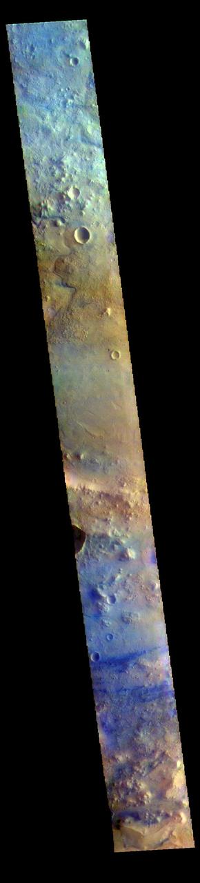 The THEMIS VIS camera contains 5 filters. The data from different filters can be combined in multiple ways to create a false color image. These false color images may reveal subtle variations of the surface not easily identified in a single band image. Today's false color image shows part of Terra Sabaea. Dark blue in this filter combination is usually basalt sand.  The THEMIS VIS camera is capable of capturing color images of the Martian surface using five different color filters. In this mode of operation, the spatial resolution and coverage of the image must be reduced to accommodate the additional data volume produced from using multiple filters. To make a color image, three of the five filter images (each in grayscale) are selected. Each is contrast enhanced and then converted to a red, green, or blue intensity image. These three images are then combined to produce a full color, single image. Because the THEMIS color filters don't span the full range of colors seen by the human eye, a color THEMIS image does not represent true color. Also, because each single-filter image is contrast enhanced before inclusion in the three-color image, the apparent color variation of the scene is exaggerated. Nevertheless, the color variation that does appear is representative of some change in color, however subtle, in the actual scene. Note that the long edges of THEMIS color images typically contain color artifacts that do not represent surface variation.  Orbit Number: 94160 Latitude: 18.2445 Longitude: 77.6595 Instrument: VIS Captured: 2023-03-07 10:37  https://photojournal.jpl.nasa.gov/catalog/PIA26127
