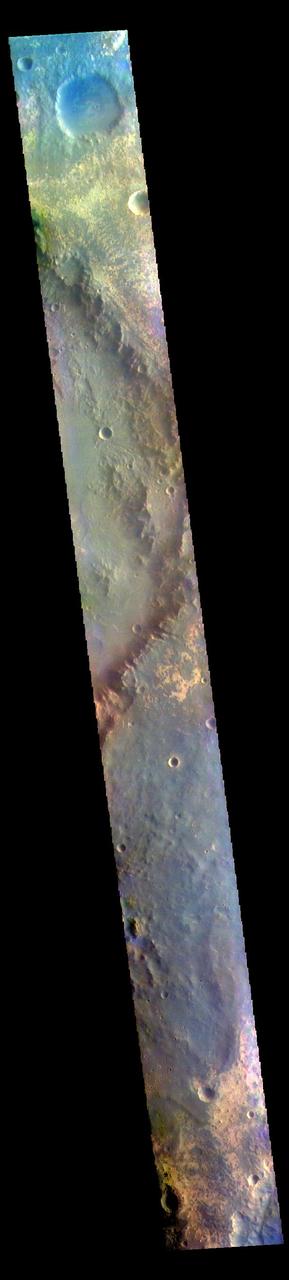 The THEMIS VIS camera contains 5 filters. The data from different filters can be combined in multiple ways to create a false color image. These false color images may reveal subtle variations of the surface not easily identified in a single band image. Today's false color image shows part of Oyama Crater. Located in Arabia Terra near Mawrth Vallis, Oyama Crater is 101km (63 miles) in diameter.  The THEMIS VIS camera is capable of capturing color images of the Martian surface using five different color filters. In this mode of operation, the spatial resolution and coverage of the image must be reduced to accommodate the additional data volume produced from using multiple filters. To make a color image, three of the five filter images (each in grayscale) are selected. Each is contrast enhanced and then converted to a red, green, or blue intensity image. These three images are then combined to produce a full color, single image. Because the THEMIS color filters don't span the full range of colors seen by the human eye, a color THEMIS image does not represent true color. Also, because each single-filter image is contrast enhanced before inclusion in the three-color image, the apparent color variation of the scene is exaggerated. Nevertheless, the color variation that does appear is representative of some change in color, however subtle, in the actual scene. Note that the long edges of THEMIS color images typically contain color artifacts that do not represent surface variation.  Orbit Number: 94363 Latitude: 23.2241 Longitude: 340.695 Instrument: VIS Captured: 2023-03-24 03:48  https://photojournal.jpl.nasa.gov/catalog/PIA26128