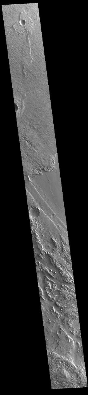 Today's VIS image shows part of Aeolis Planum. The surface in this region has been heavily eroded by wind action. In regions of poorly cemented surface materials it is possible to create large features due to just the action of the wind. The direction of the wind aligns with the ridges and valleys. The dominant wind direction in this region is southeast to northwest; however, other wind directions can occur within a localized region. Orbit Number: 94819 Latitude: -1.42232 Longitude: 148.839 Instrument: VIS Captured: 2023-04-30 16:46 https://photojournal.jpl.nasa.gov/catalog/PIA26178
