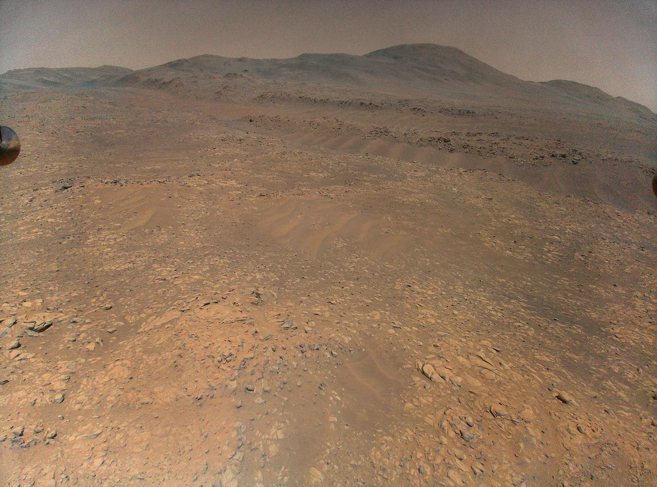 NASA's Ingenuity Mars Helicopter captured this view of Martian sand ripples on Oct. 27, 2023, during Flight 64. The spot where the helicopter would later park and remain during Mars solar conjunction is visible in this image.  https://photojournal.jpl.nasa.gov/catalog/PIA26201