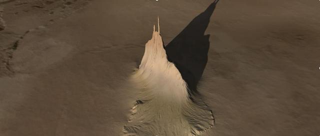 Created using data collected by the JunoCam imager aboard NASA's Juno spacecraft, this animation is an artist's concept that shows a view of a mountain on the Jovian moon Io. The data was recorded during close flybys of the moon in December 2023 and February 2024. The mountain, which the Juno science team has nicknamed "Steeple Mountain," is between 3 and 4.3 miles (5 and 7 kilometers) in height.  One side of Steeple Mountain is in shade in the animation because only one side of the mountain was illuminated when imaged by JunoCam.  Animation available at https://photojournal.jpl.nasa.gov/catalog/PIA26294