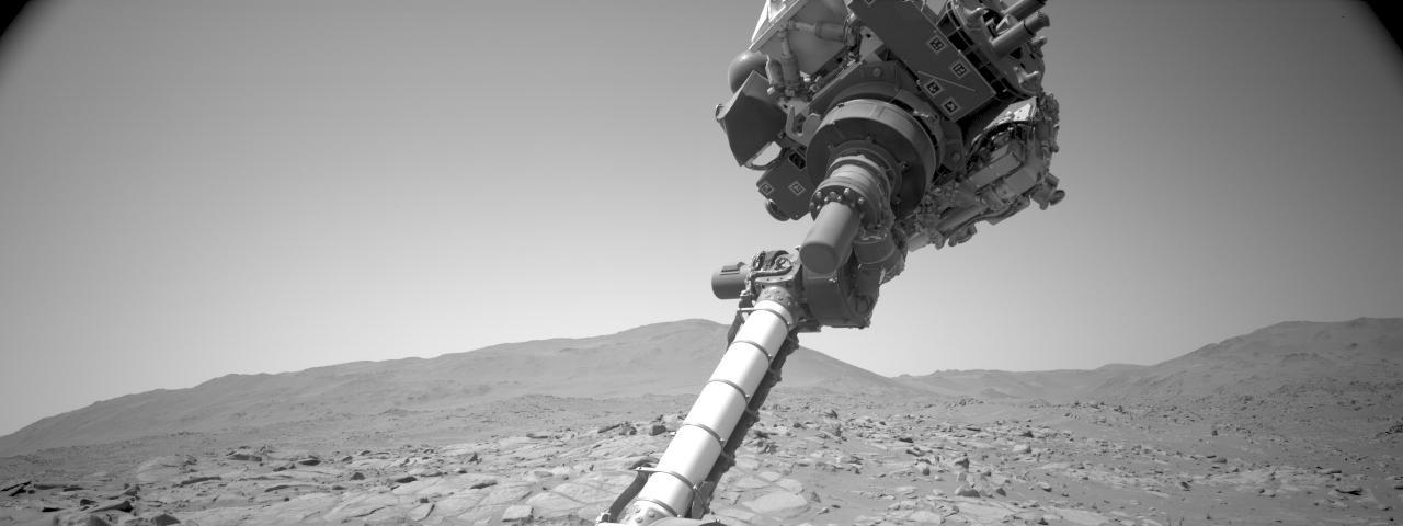 Video from a navigation camera aboard NASA's Perseverance Mars rover shows the position of a cover on the SHERLOC (Scanning Habitable Environments with Raman & Luminescence for Organics and Chemicals) instrument. During the video, the rover's robotic arm was commanded to move, allowing mission engineers to observe whether the cover for the Autofocus and Context Imager (ACI) camera would change position independent of the commanded motion. The imagery – acquired Jan. 23, 2024 (the 1,041 Martian day, or sol, of the mission) – indicated that the cover was not responsive.  On Jan. 6, 2024, a movable lens cover designed to protect the instrument's spectrometer and one of its cameras from dust became frozen in a position that prevented SHERLOC from collecting data. The rover team found a way to address the issue and confirmed the instrument is working on June 17, 2024.  A key objective for Perseverance's mission on Mars is astrobiology, including the search for signs of ancient microbial life. The rover is also characterizing the planet's geology and past climate, which paves the way for human exploration of the Red Planet. JPL, which is managed for NASA by Caltech in Pasadena, California, built and manages operations of the Perseverance rover.  Animation available at https://photojournal.jpl.nasa.gov/catalog/PIA26339 