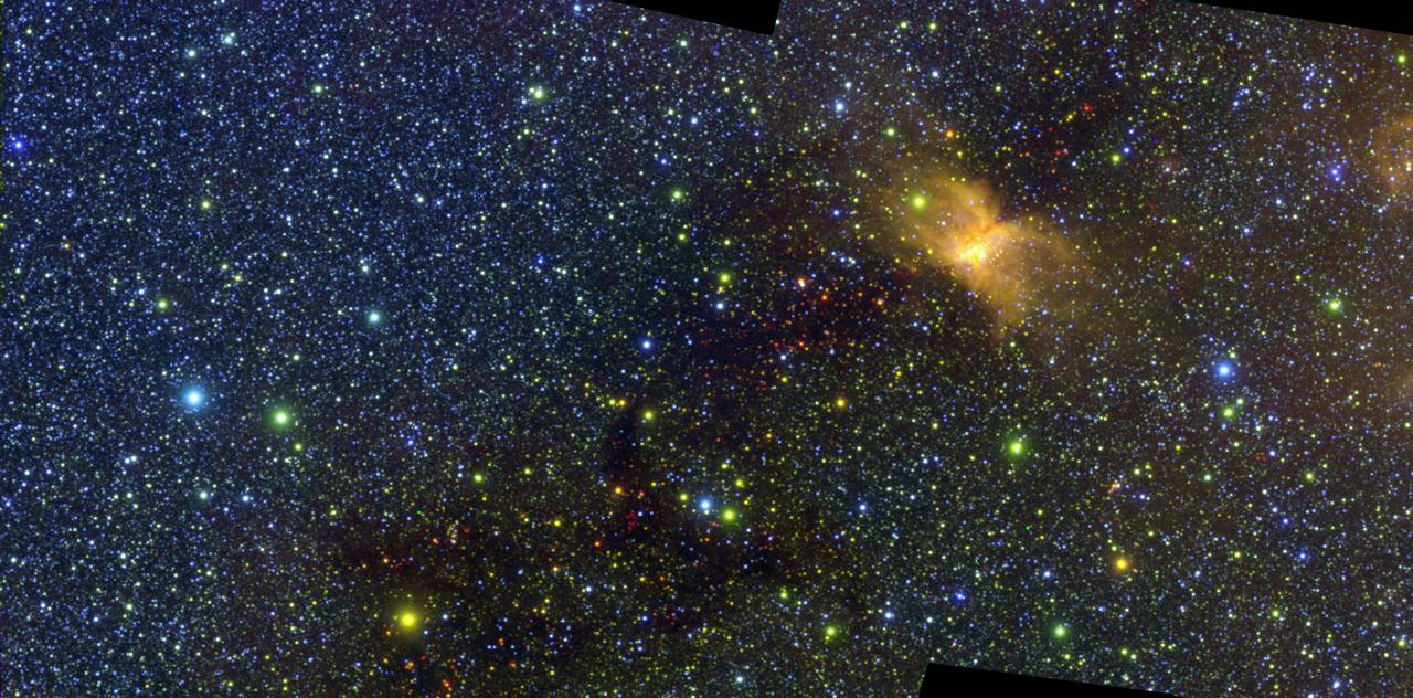 This image of the Vela Molecular Ridge was captured by NASA's SPHEREx (Spectro-Photometer for the History of the Universe, Epoch of Reionization and Ices Explorer) and was part of the mission's first public data release on July 2, 2025. The yellow patch at right is RCW 36, an emission nebula – a cloud of interstellar gas and dust that glows in some infrared colors due to radiation from nearby stars.  SPHEREx detects 102 infrared wavelengths, or colors, that aren't visible to the human eye.  https://photojournal.jpl.nasa.gov/catalog/PIA26354