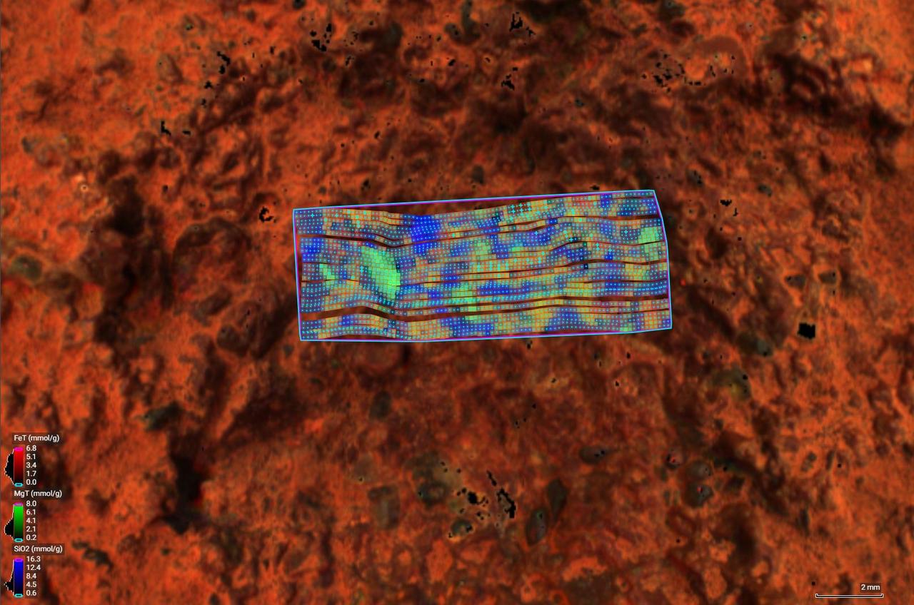 This image of a rock target nicknamed "Thunderbolt Peak" was created by NASA's Perseverance Mars rover using the Planetary Instrument for X-ray Lithochemistry (PIXL) – an instrument on the end of the rover's robotic arm that determines chemistry and mineral composition by zapping a rock with X-rays. Each blue dot in the image represents a spot where an X-ray hit. By measuring the interaction of the X-rays with the rock, scientists can map which minerals are present in a rock's surface and how much of them, plus the size, shape, and crystallinity of the rock grains.  In the case of Thunderbolt Peak, three elements were especially abundant: iron, magnesium, and silica. The image and data were collected on July 8, 2024, the 1,202nd Martian day, or sol, of Perseverance's mission.  https://photojournal.jpl.nasa.gov/catalog/PIA26365