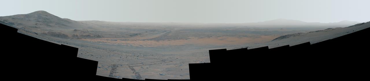 This enhanced-color, high-resolution mosaic showing Mars' Jezero Crater was taken by the Mastcam-Z instrument on NASA's Perseverance as the rover climbed the crater's western wall. Many of the landmarks visited by the rover during its 3½-year exploration of Jezero can be seen, and the vehicle's tracks are also visible.  The 44 frames used to generate the mosaic were acquired on Sept. 27, 2024, the 1,282nd Martian day, or sol, of Perseverance's mission. The rover was near a location the Perseverance science team calls "Faraway Rock," about halfway up the climb.  Arizona State University leads the operations of the Mastcam-Z instrument, working in collaboration with Malin Space Science Systems in San Diego, on the design, fabrication, testing, and operation of the cameras, and in collaboration with the Niels Bohr Institute of the University of Copenhagen on the design, fabrication, and testing of the calibration targets.  A key objective for Perseverance's mission on Mars is astrobiology, including the search for signs of ancient microbial life. The rover will characterize the planet's geology and past climate, pave the way for human exploration of the Red Planet, and be the first mission to collect and cache Martian rock and regolith (broken rock and dust).  Subsequent NASA missions, in cooperation with ESA (European Space Agency), would send spacecraft to Mars to collect these sealed samples from the surface and return them to Earth for in-depth analysis.  The Mars 2020 Perseverance mission is part of NASA's Moon to Mars exploration approach, which includes Artemis missions to the Moon that will help prepare for human exploration of the Red Planet.  https://photojournal.jpl.nasa.gov/catalog/PIA26378
