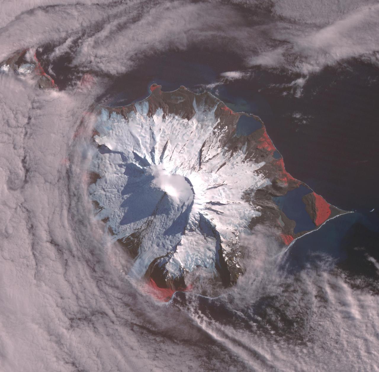 Heard, a remote volcanic island located in the southern Indian Ocean, is an Australian Territory. It consists of two volcanic structures: Big Ben and the smaller Mt. Dixon. The active Mawson Peak is located within a 5-6 km-wide caldera breached to the SW side of Big Ben. Intermittent eruptions have occurred since 1910; the latest in May 2023. The image was acquired March 18, 2025, covers an area of 39.7 by 40.4 km, and is located at 53 degrees south, 73.5 degrees east. https://photojournal.jpl.nasa.gov/catalog/PIA26509