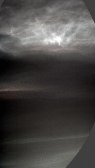 NASA's Curiosity Mars rover used its left Mast Camera, or Mastcam, to capture these drifting noctilucent, or twilight, clouds on Jan. 17, 2025, the 4,426th Martian day, or sol, of the mission. The left Mastcam has a stuck color filter wheel, which is why part of the imagery appears cut off in three corners.  The original recording taken by Curiosity was 16 minutes; this video has been speeded up by about 480 times (and it loops four times).  The clouds at the top of the frame, including the falling white plumes, are made of carbon dioxide ice. The plumes are an estimated 37 to 50 miles (60 to 80 kilometers) above the Martian surface; they could fall as low as 31 miles (50 kilometers) above the surface before they would evaporate due to rising temperatures.  In the lower half of the frame at the beginning of the video, a different set of very faint clouds is visible. These are water-ice clouds are hovering at roughly 31 miles (50 kilometers) in altitude.  The brightness has been stretched to make certain colors more visible in this enhanced-color imagery.  This is the fourth Mars year that twilight clouds have been observed by Curiosity; previous observations were made in 2019, 2021, and 2023.  Animation available at https://photojournal.jpl.nasa.gov/catalog/PIA26519