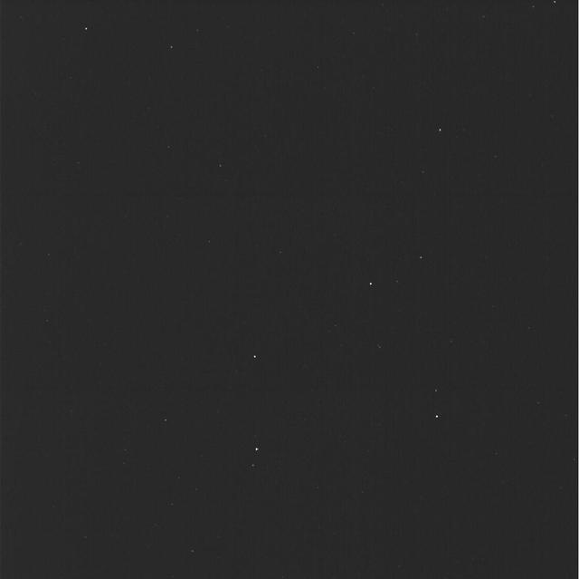 This mosaic of a star field was made from three images captured Dec. 4, 2024, by star tracker cameras aboard NASA's Europa Clipper spacecraft. The pair of star trackers (formally known as the stellar reference units) captured and transmitted Europa Clipper's first imagery of space. The picture, composed of three shots, shows tiny pinpricks of light from stars 150 to 300 light-years away. The starfield represents only about 0.1% of the full sky around the spacecraft, but by mapping the stars in just that small slice of sky, the orbiter is able to determine where it is pointed and orient itself correctly.  The starfield includes the four brightest stars – Gienah, Algorab, Kraz, and Alchiba – of the constellation Corvus, which is Latin for "crow," a bird in Greek mythology that was associated with Apollo. Besides being interesting to stargazers, the photos signal the successful checkout of the star trackers. The spacecraft checkout phase has been going on since Europa Clipper launched on a SpaceX Falcon Heavy rocket on Oct. 14, 2024.  Europa Clipper's three main science objectives are to determine the thickness of the moon's icy shell and its interactions with the ocean below, to investigate its composition, and to characterize its geology. The mission's detailed exploration of Europa will help scientists better understand the astrobiological potential for habitable worlds beyond our planet.  https://photojournal.jpl.nasa.gov/catalog/PIA26561