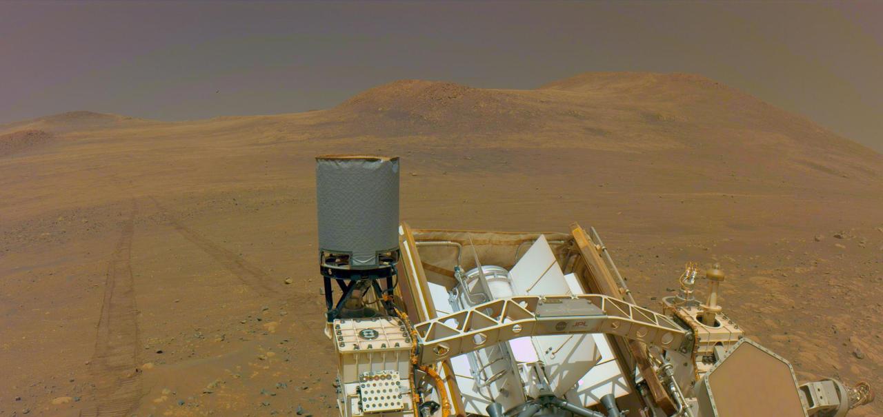 One of the navigation cameras on NASA's Perseverance captured the rover's tracks coming from an area called "Witch Hazel Hill," on May 13, 2025, the 1,503rd Martian day, or sol, of the mission.  The Mars 2020 Perseverance mission is part of NASA's Moon to Mars exploration approach, which includes Artemis missions to the Moon that will help prepare for human exploration of the Red Planet.  https://photojournal.jpl.nasa.gov/catalog/PIA26573