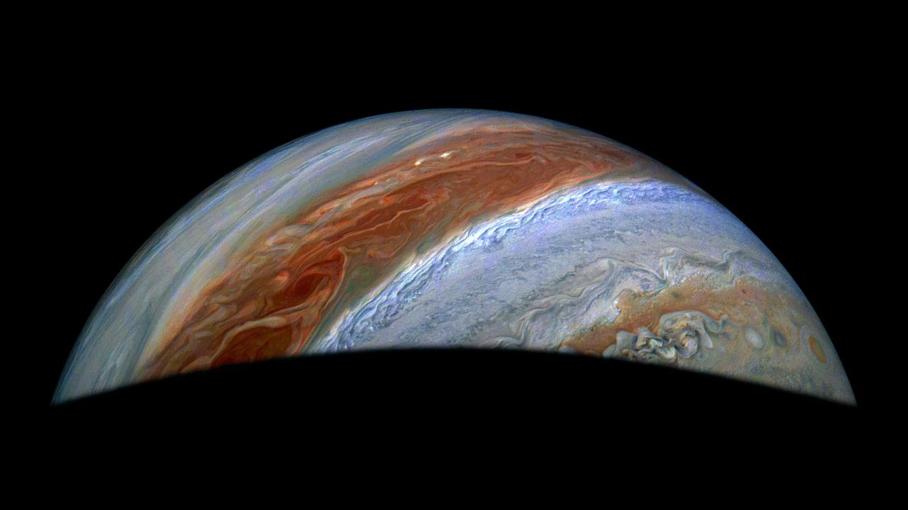 JunoCam, the visible light imager aboard NASA's Juno, captured this view of Jupiter's northern high latitudes during the spacecraft's 69th flyby of the giant planet on Jan. 28, 2025. Jupiter's belts and zones stand out in this enhanced color rendition, along with the turbulence along their edges caused by winds going in different directions.  The original JunoCam image used to produce this view was taken from an altitude of about 36,000 miles (58,000 kilometers) above Jupiter's cloud tops. Citizen scientist Jackie Branc processed the image.  https://photojournal.jpl.nasa.gov/catalog/PIA26595