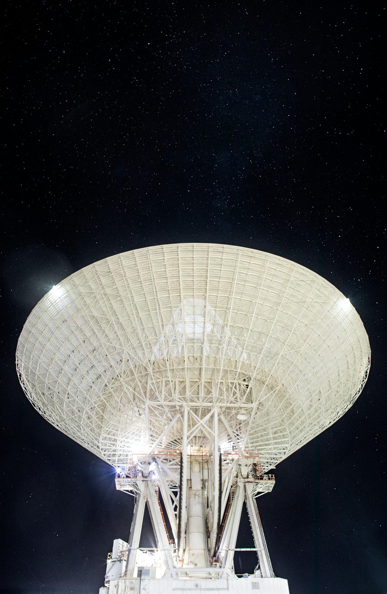 Deep Space Station 14 (DSS-14), the 230-foot-wide (70-meter) antenna at the Goldstone Deep Space Communications Complex near Barstow, California, points up toward a starry sky in September 2025. Goldstone is part of NASA’s Deep Space Network (DSN), which operates three complexes around the globe to support communications with dozens of deep space missions. DSS-14 is also the agency’s Goldstone Solar System Radar, which is used to observe asteroids that come close to Earth. For more information about the DSN, visit: https://www.nasa.gov/communicating-with-missions/dsn/