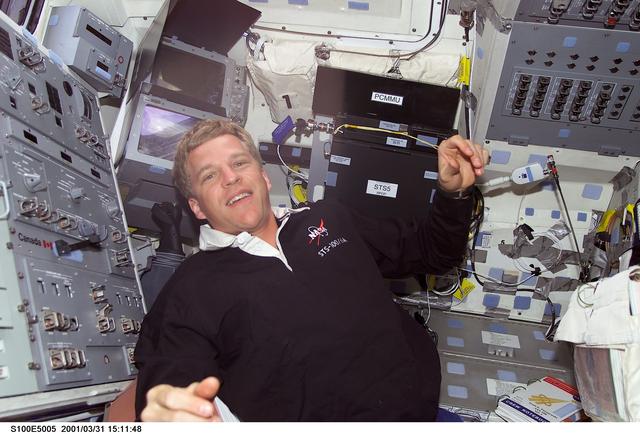 NASA image: MS Parazynski poses on the flight deck of Endeavour