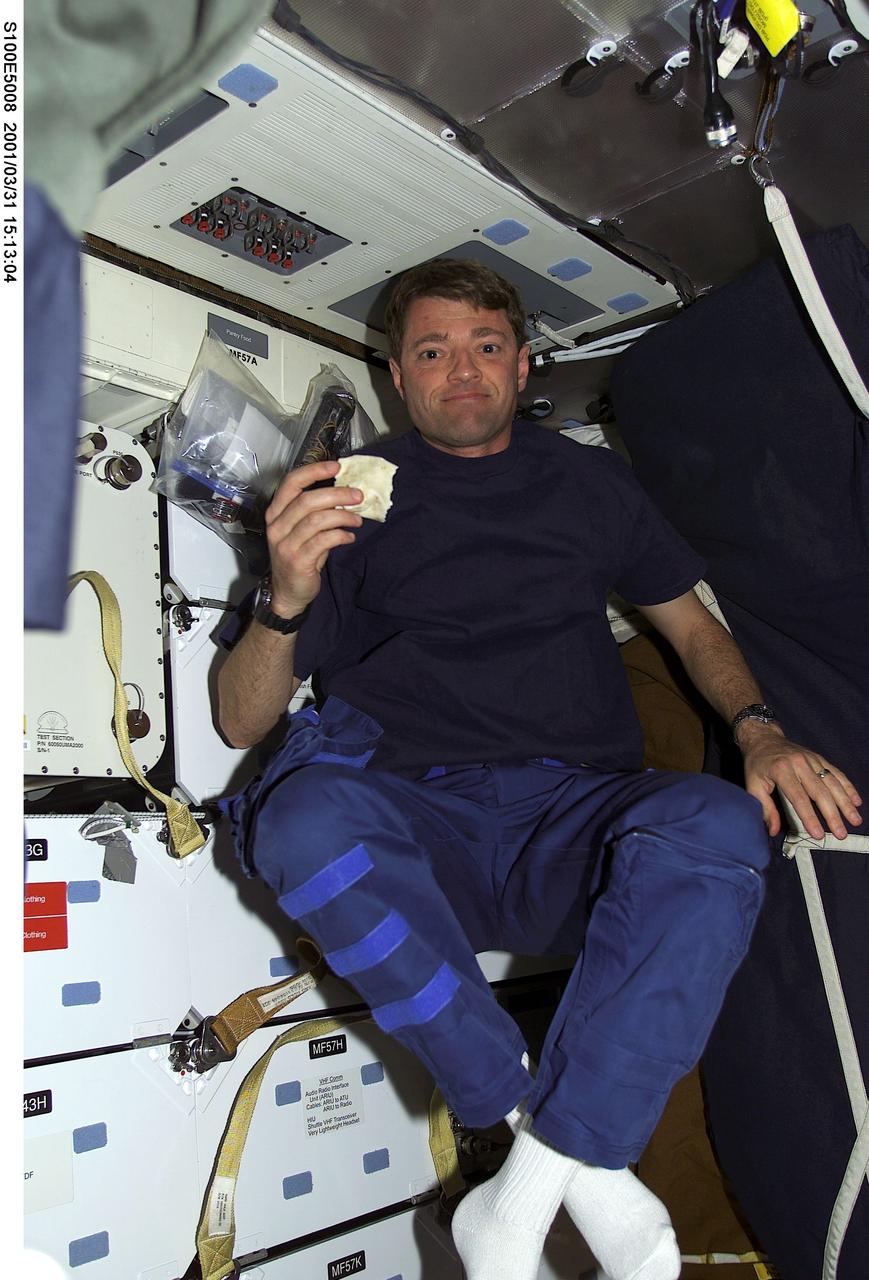 S100-E-5008 (20 April 2001) --- Astronaut Jeffrey S. Ashby, pilot, is pictured on Endeavour's middeck as the shuttle steadily makes its way toward the International Space Station (ISS) following an April 19 launch. This image was recorded by a fellow crew member using a digital still camera.