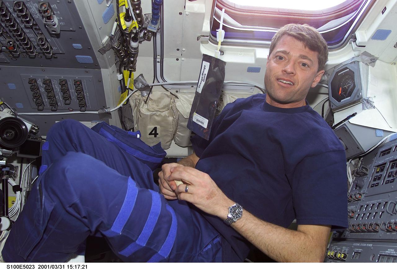 S100-E-5023 (20 April 2001) --- Astronaut Jeffrey S. Ashby, pilot, is pictured on Endeavour's flight deck as the shuttle steadily makes its way toward the International Space Station (ISS) following an April 19 launch. This image was recorded by a fellow crew member using a digital still camera.