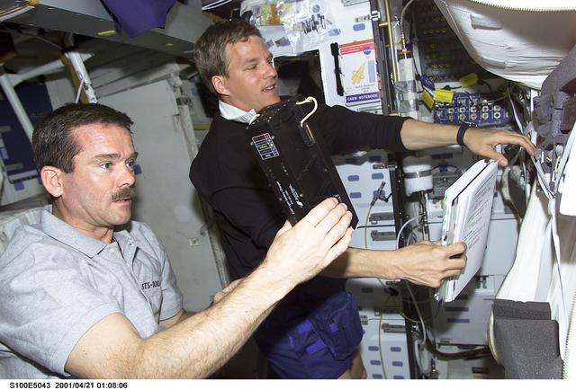 NASA image: MS Parazynski and MS Hadfield work on the middeck of Endeavour
