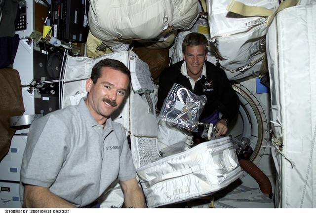 NASA image: MS Parazynski and MS Hadfield work on the middeck of Endeavour