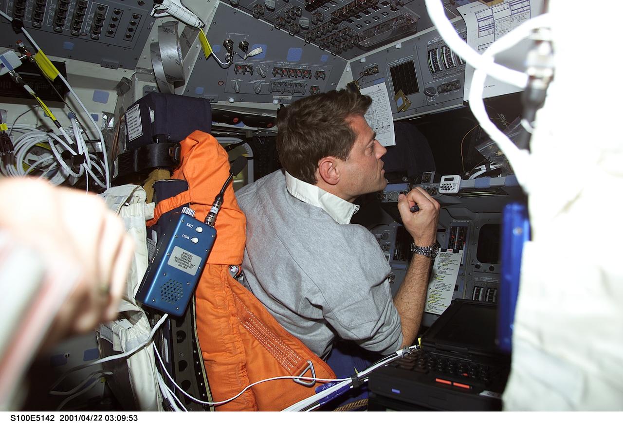 S100-E-5142 (21 April 2001) --- Astronaut Jeffrey S. Ashby, pilot, temporarily occupies the commander's station for a task on the flight deck of the Space Shuttle Endeavour as the seven-member crew prepares for its union with the International Space Station (ISS). The photo was recorded with a digital still camera.