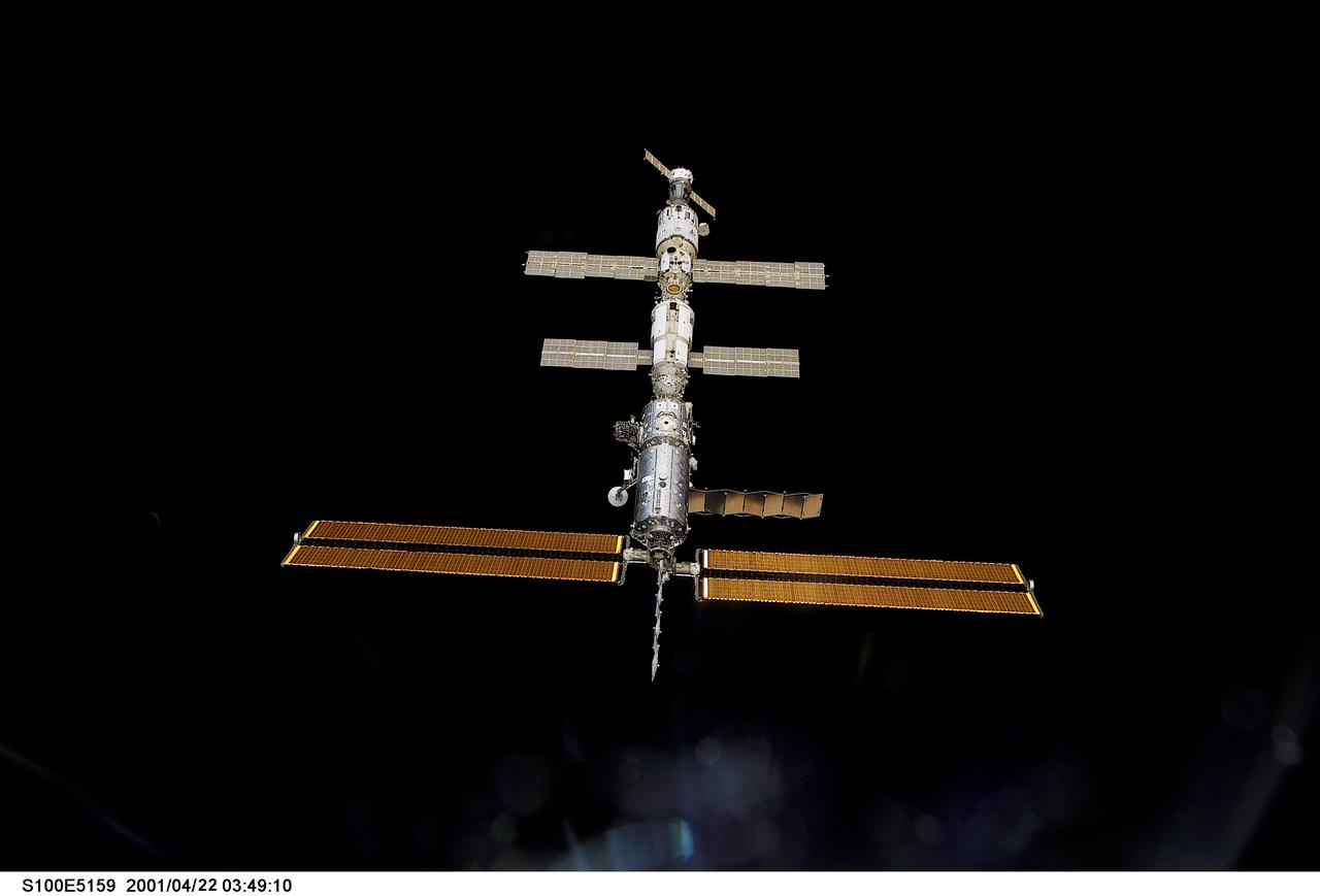 S100-E-5159 (21 April 2001) --- One of the crew members aboard the Space Shuttle Endeavour used a digital still camera to record this image of the International Space Station (ISS), backdropped against the blackness of space.