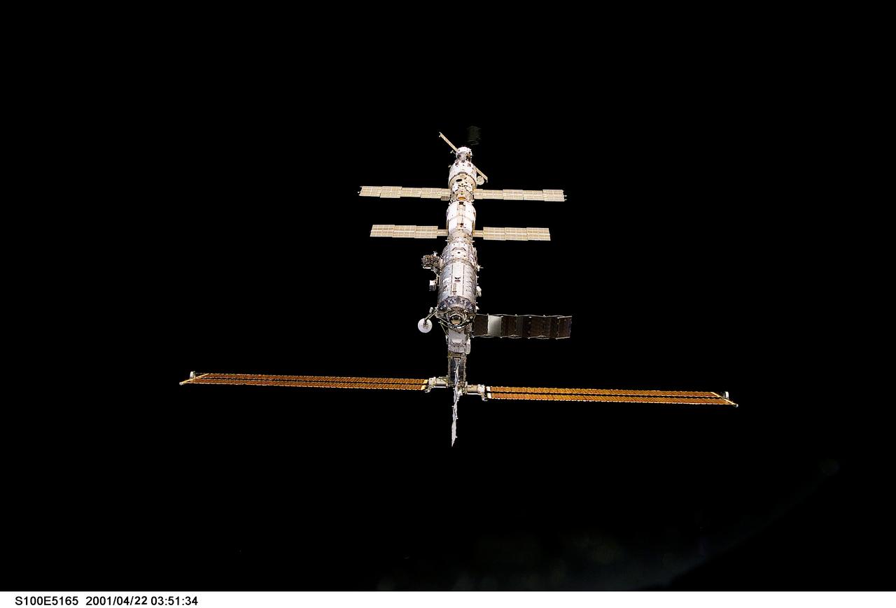 S100-E-5165 (21 April 2001) --- One of the crew members aboard the Space Shuttle Endeavour used a digital still camera to record this image of the International Space Station (ISS), backdropped against the blackness of space.