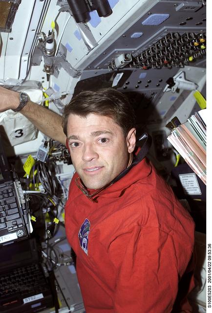 NASA image: Pilot Ashby works at the aft crew workstation on the flight deck of Endeavour
