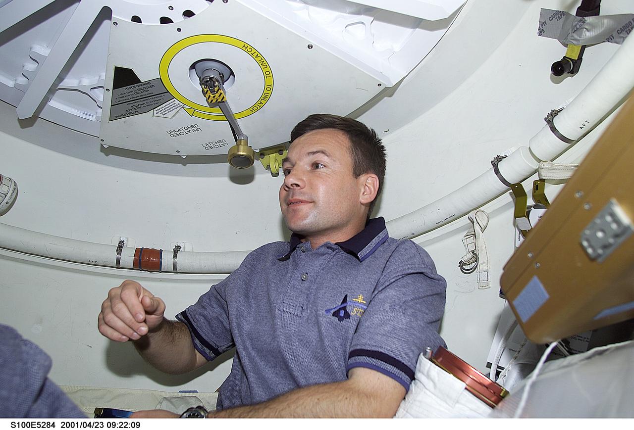 S100-E-5284 (23 April 2001) --- Cosmonaut Yuri V. Lonchakov, STS-100 mission specialist representing Rosaviakosmos, is in the Pressurized Mating Adapter (PMA-2) prior to hatch-opening. The image was recorded with a digital still camera.