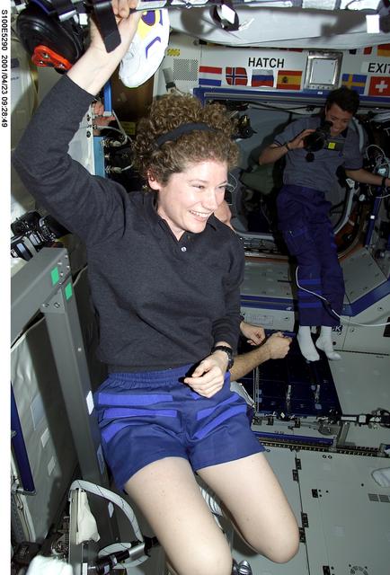 NASA image: Expedition Two's Helms welcomes the STS-100 crew into the ISS