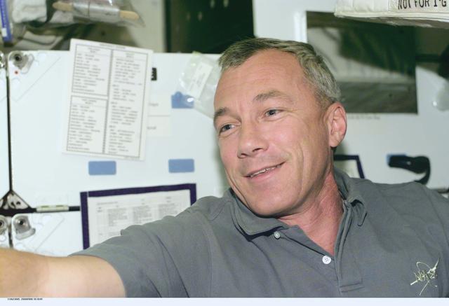 NASA image: Commander Wilcutt at work aboard Atlantis during STS-106