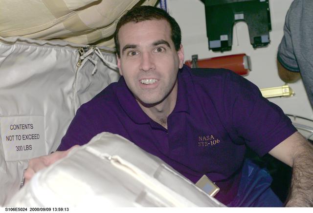 NASA image: MS Richard Mastracchio at work aboard Atlantis during STS-106