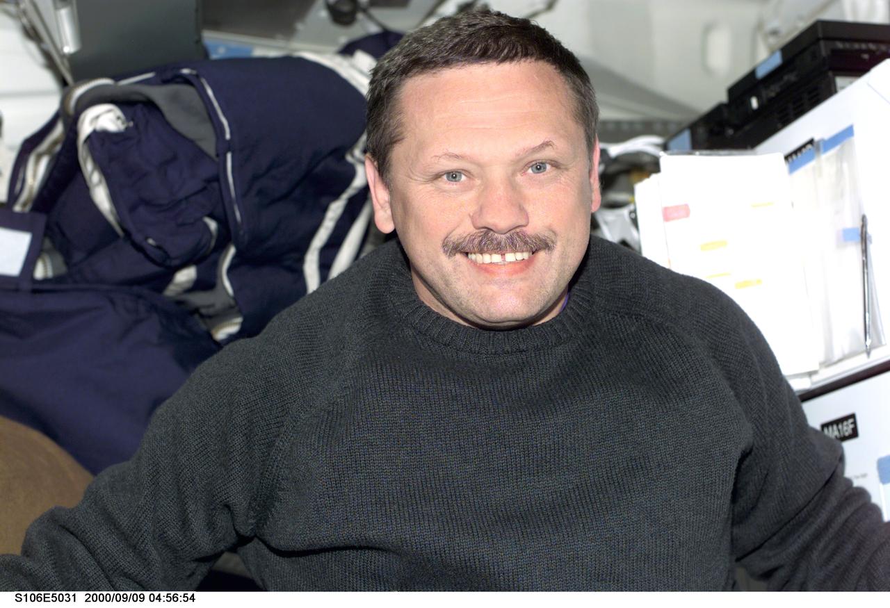 S106-E-5031 (9 September 2000) --- Cosmonaut Boris V. Morukov, one of two mission specialists who represent the Russian Aviation and Space Agency on this scheduled 11-day mission,  appears to like the progress of the effort by the seven-member crew  to keep up its busy agenda onboard the Space Shuttle Atlantis. The crew is less than 24 hours away from Atlantis' scheduled docking with the International Space Station (ISS).