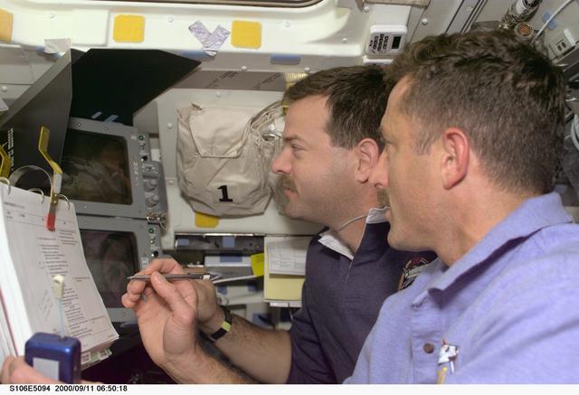 NASA image: Pilot Altman and MS Burbank at work on Atlantis during STS-106s EVA