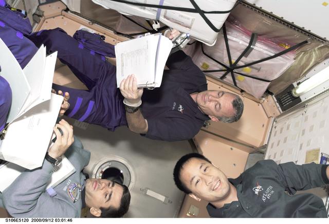 NASA image: Wilcutt, Malenchenko and Lu working in Node 1 during STS-106