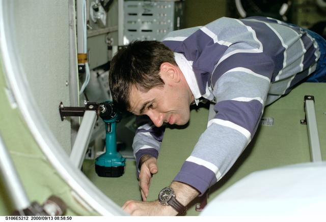 NASA image: MS Malenchenko works in Zvezda during STS-106