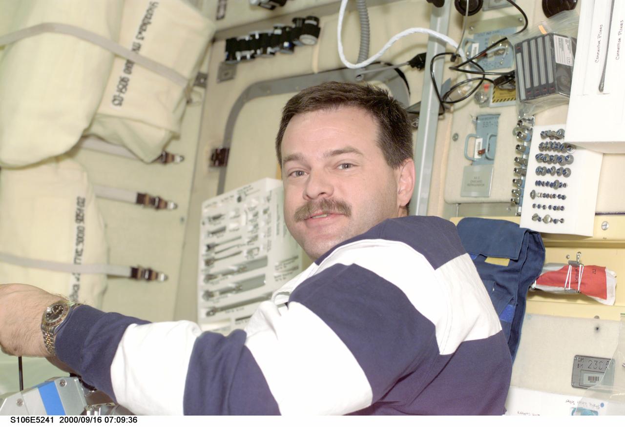 S106-E-5241 (16 September 2000) --- Astronaut Scott D. Altman, pilot, and six STS-106 crewmates are noticing the Zvezda service module is looking more and more ready for permanent habitation following several days of work by the crew.