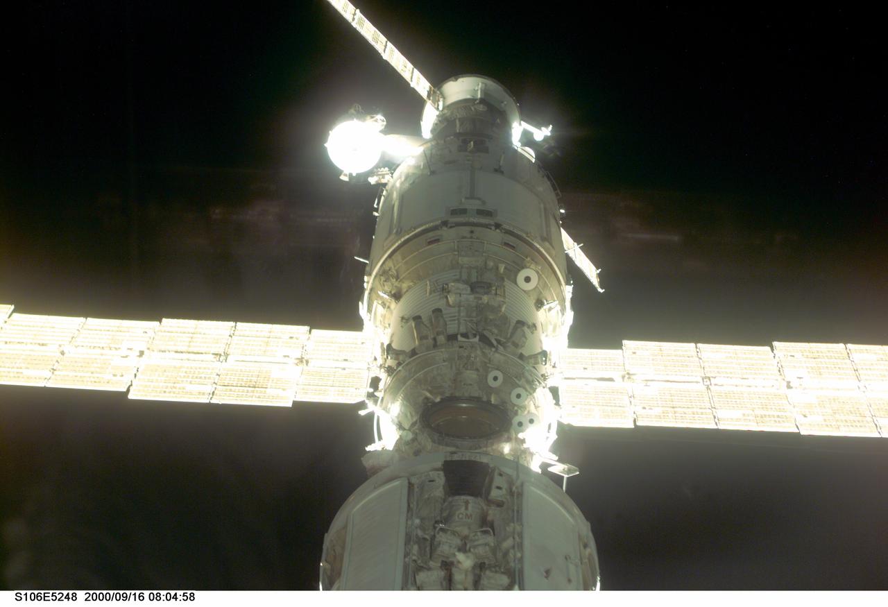 S106-E-5248 (16 September 2000) ---  An out-the-window view with the electronic still camera (ESC) represents one of the final STS-106 closeup looks  at the International Space Station (ISS)  as the Atlantis crew works rapidly to wrap up chores on the station.
