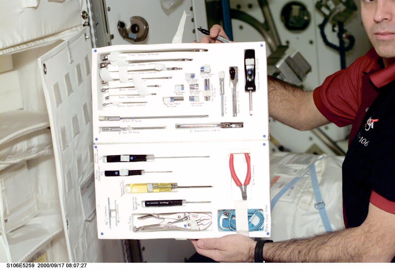 S106-E-5259 (17 September 2000) ---  Tools that look much like those that you might find in any residential garage are being left onboard the International Space Station (ISS) for its future residents. Holding this set is astronaut Richard A. Mastracchio, partially out of frame. As any &quot;handy person&quot; will tell you, a variety of basic tools are a life-saver when any one of a number of contingencies arise.